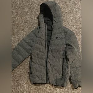 Nike Xs, very nice and warm jacket. Used but great condition